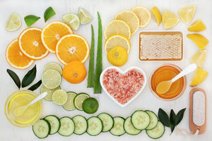 Various slices of citrus and cucumber with honey