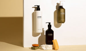 a collection of various shampoo bottles and soaps with logos